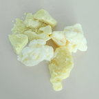 Variety of cosmetic butters on a light gray background