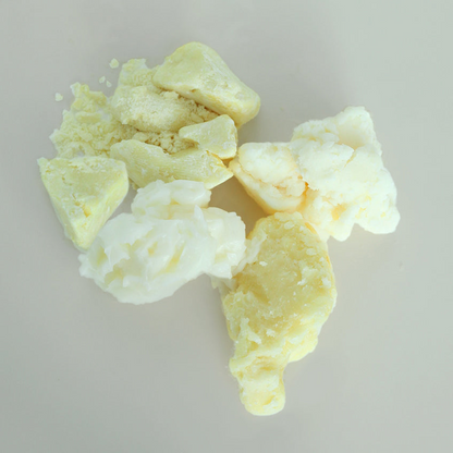 Variety of cosmetic butters on a light gray background