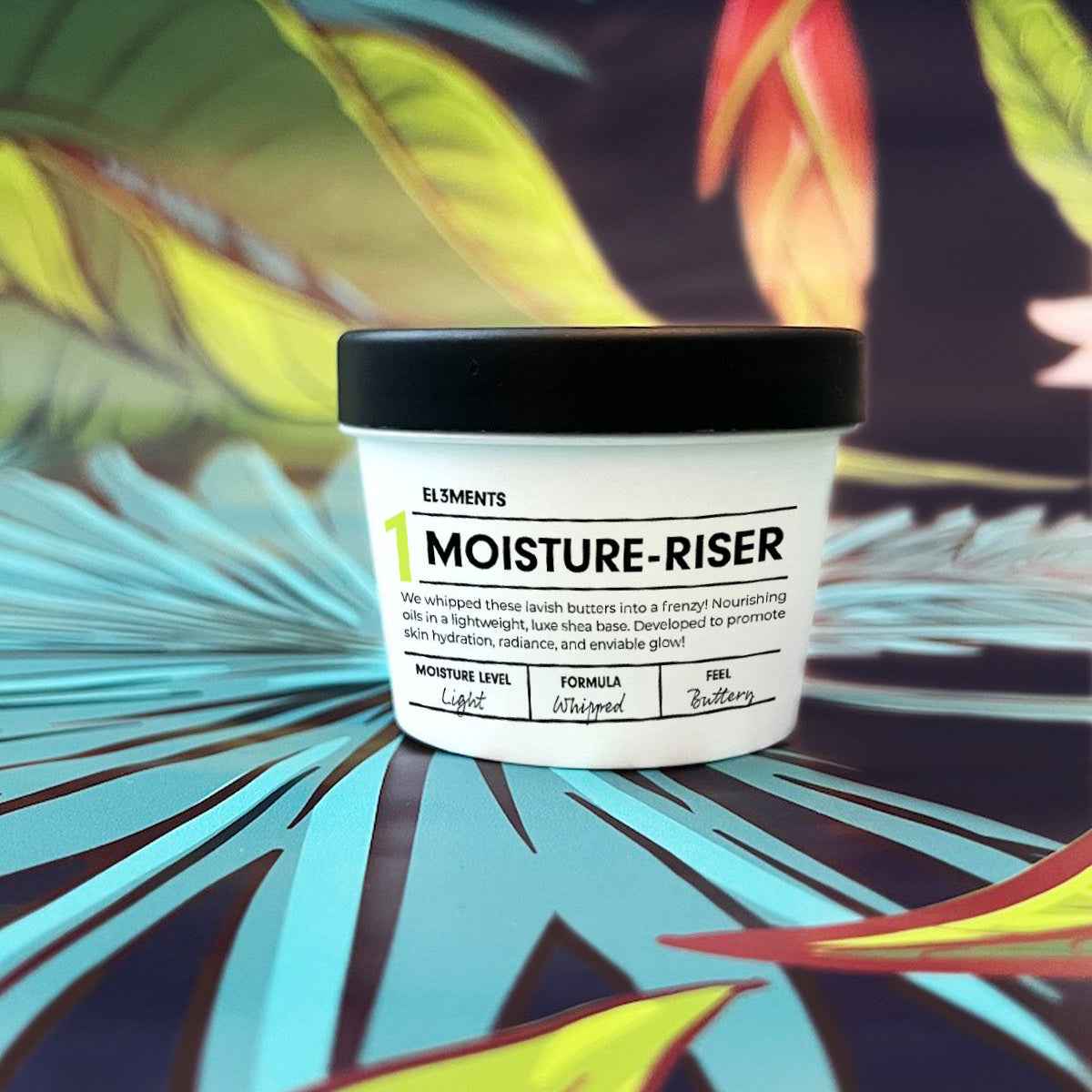 MOISTURE-RISER Body Butter demi jar on tropical background