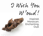 Oud fragrance slide description with piece of wood