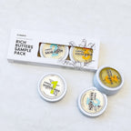 El3ments Rich Butters Sample Pack with additional aluminum tins  on a textured white background