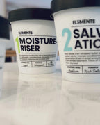 El3ments new product Demis clip jars on quartz counter top